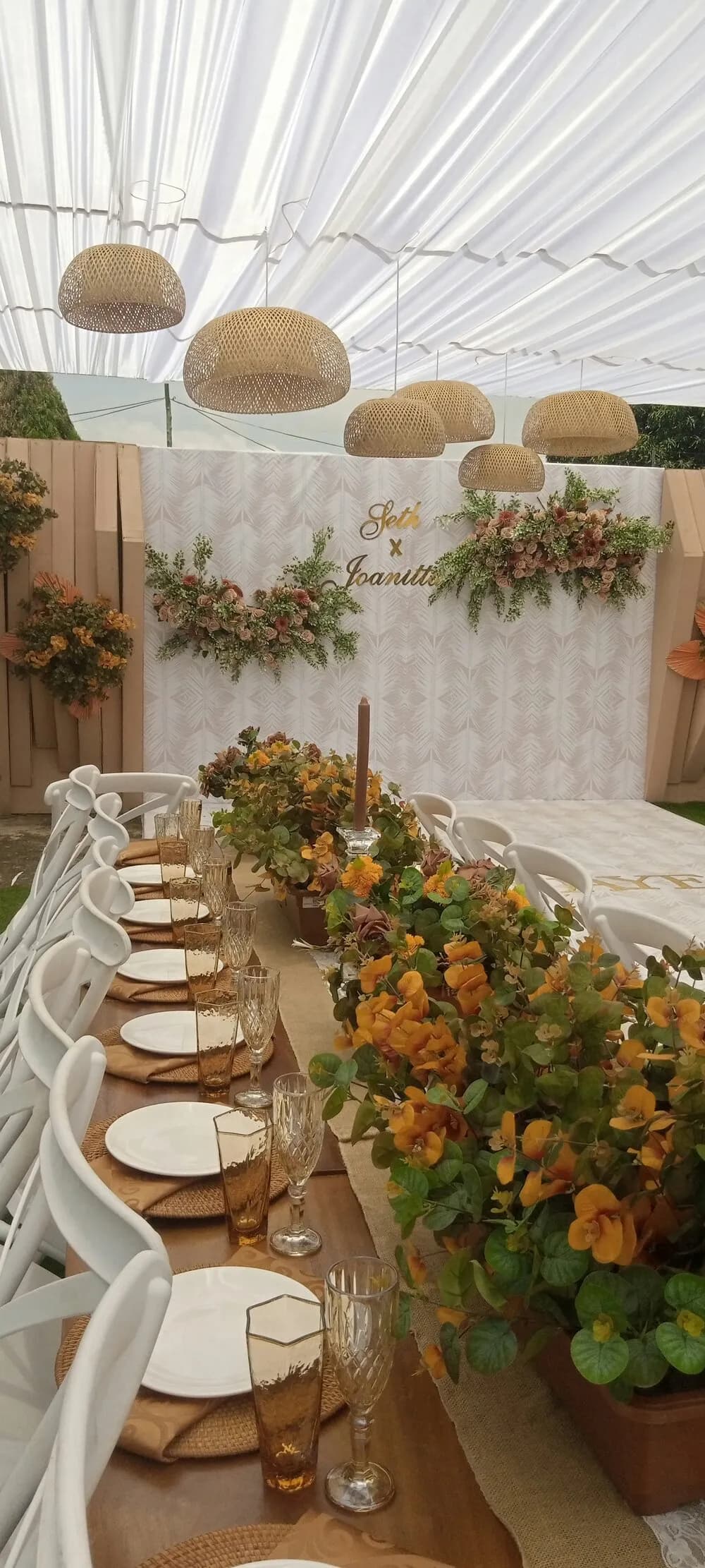 Graduation celebration table with floral arrangements by London event planner Eshas Events